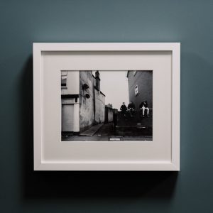 Atherstone Ball Game Framed Silver Gelatin Print. Traditional darkroom print made by the artist and signed on verso. Printed onto 8×10″ Ilford Multigrade Resin Coated Deluxe Satin 190gsm paper, front mounted and framed with museum anti reflective glass.